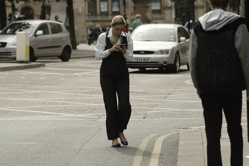 Texting while crossing the street Texting while crossing the street